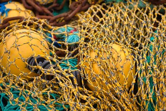 Fishing nets and buoys in the harbour of Guilvinec