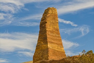 Obelisk in the rock vegetation of Petra