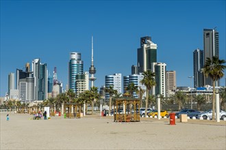Shuwaikh beach before the skyline of Kuwait City