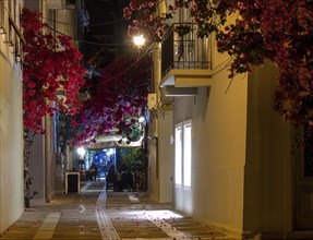 View of a narrow street and cafe in Nafplio