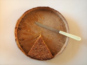 Slice of hazelnut cake pie vegetarian food