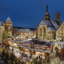 Christmas market in front of the collegiate church on Schillerplatz