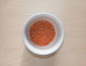 Red lentils in bow