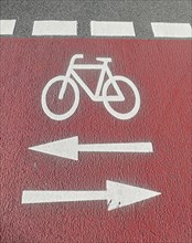 Red cycle path with ground marking