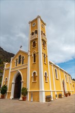 Lovely yellow church of La Encarnacion in the village of Hermigua in the north of La Gomera