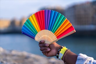 Colorful rainbow fan during gay pride