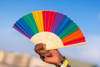 Colorful rainbow fan during gay pride