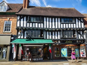 Half-timbered house with shops