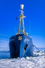 Ship at the ice edge in the arctic