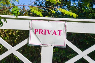 PRIVATE sign on a garden gate
