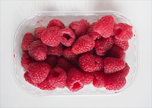 Raspberry fruit in plastic box