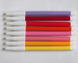 Purple red pink and yellow felt tip pen
