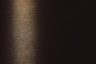 Metallic brushed background bronze colour with gradient into brown golden