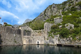 Historic fortifications at the South Gate with 13th century drawbridge in Old Town of Kotor