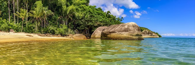 Panoramic image of a deserted and paradisiacal beach on Ilha Grande on the green coast in the south of the state of Rio de Janeiro