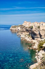 Steep coast of Bonifacio with old town on a limestone plateau
