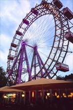 Historic Ferris wheel called Wiener Riesenrad in central public park or Prater park
