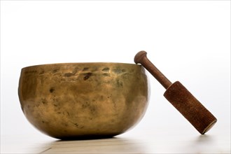 Closeup of a Tibetan singing bowl isolated on a white background