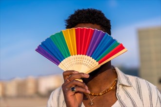 Colorful rainbow fan during gay pride