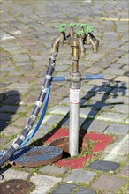 Standpipe with water taps at an underground hydrant