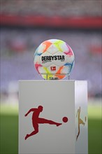 Adidas Derbystar match ball on pedestal in front of the start of a Bundesliga match