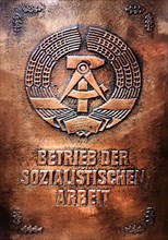 Copper plaque Betrieb der Sozialistischen Arbeit with GDR coat of arms