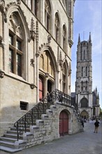 Stairs of entrance belfry and the Saint-Bavo's cathedral