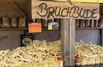 Market stall with fresh asparagus