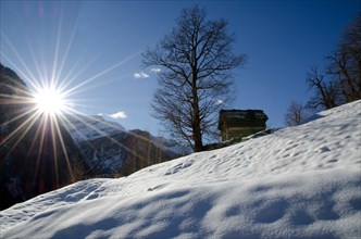 Sunshine over the mountain with snow