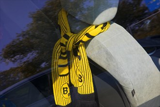 Fan scarf of Borussia Dortmund in a car