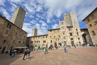 Piazza della Cisterna with the family towers
