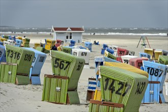 Empty beach chairs on a cool day in the early season on the beach of Langeoog