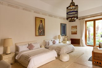 Bedroom with portrait of Farah Diba Pahlavi