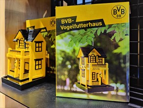 Fan articles BVB bird feeder house in a fan shop of Borussia Dortmund