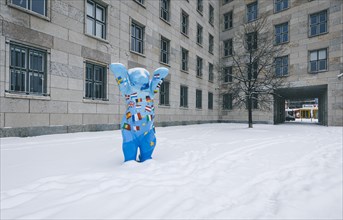 A Berliner Beer stands in the snow in front of the Federal Ministry of Finance in Berlin. 09.02.2021.