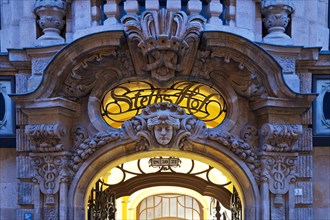 Neo-baroque architectural decoration on the portal of Steibs Hof at the blue hour