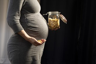 Pregnant woman and hazelnuts