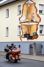 House with funny mural