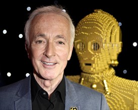 Anthony Daniels who played C3PO in all 6 Star Wars Movies with a Lego model of his character at Star Wars Episode 1 3D at The Empire
