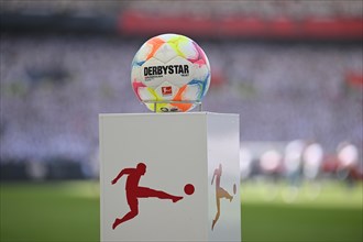 Adidas Derbystar match ball on pedestal in front of the start of a Bundesliga match
