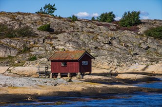 Small wooden beach house on an archipelago island off Stroemstad