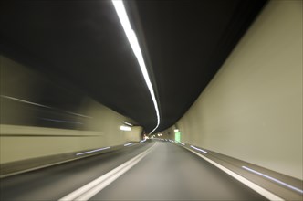 Narrow tunnel with light in San Bernardino