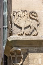 Cornerstone with heraldic mythical creatures