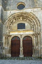 Avallon. Porch and tympanum of collegiale Notre Dame and Saint Lazare .Yonne department. Morvan regional nature park.