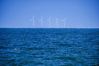 Wind turbines of the offshore wind farm EnBW Baltic 1 stand 16km off the coast of the Fischland-Darâˆšue-Zingst peninsula