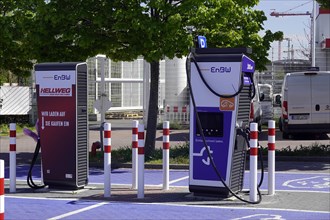 Two charging stations from EnBW for electric cars in the car park of Hellweg
