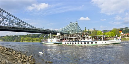 An Elbe steamer passes through the Blue Wonder in Dresden