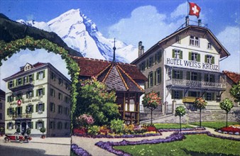 Vintage postcard of the early 20th century showing drawing of Hotel Weiss Kreuz in Swiss holiday destination