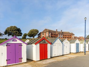 Colourful beach huts on seafront