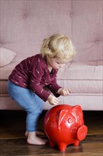 Child with piggy bank